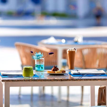 Pickalbatros Blu Spa Resort - Adults Friendly 16 Years Plus- Ultra All-Inclusive Hurghada Luaran gambar A table at a restaurant